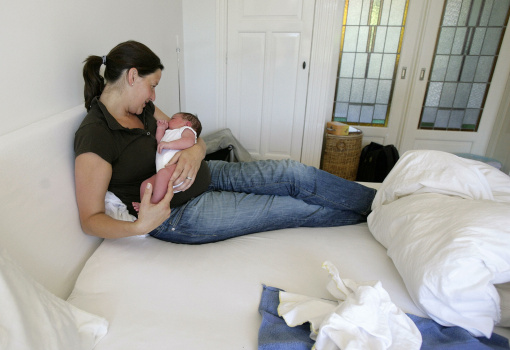 Mother with home born child