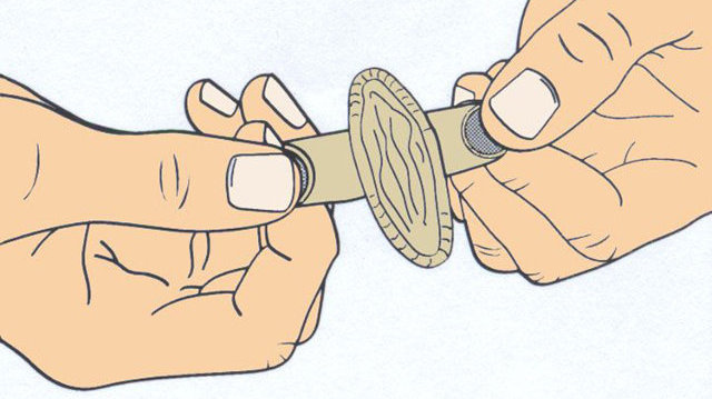 One experimental condom has tabs on either side so it's easier to put on in the dark.