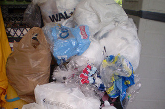 A pile of plastic bags await recycling.