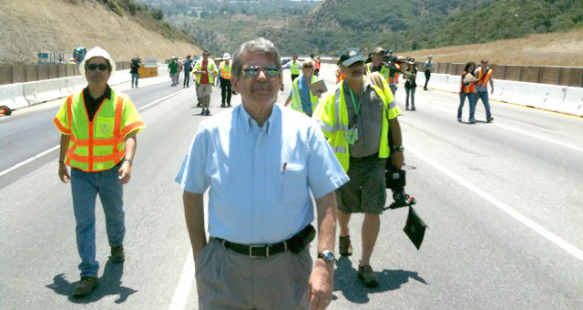 Supervisor Zev Yaroslavsky, the man who gave carmageddon it's name, walks the empty 405 on July 16, 2011, as crews worked to demolish a section of the Mulholland Bridge.