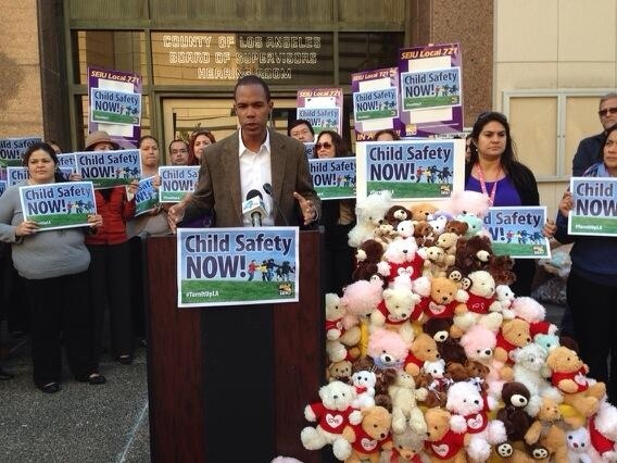 Social workers with the Department of Children and Family Services rally outside the L.A. Board of Supervisors, demanding lower caseloads.