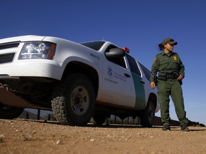 A U.S. Border Patrol agent patrols along the U.S.-Mexico border in Naco, Ariz., in September.