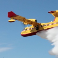 Canadair Super Scooper releasing its payload in a demonstration at the Van Nuys Airport 9-4-2012.