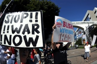 Demonstrators protest in front of Sony Pictures Studios on April 21, 2011, as President Barak Obama attends a major fundraiser for his 2012 billion-dollar presidential reelection campaign.