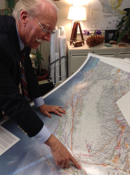 State Geologist John Parrish shows off a map of California with 15,000 faults on it. He says there are likely many more faults that have not yet been discovered.