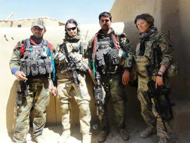 Sgt. Jaclyn O'Shea (second from left) and Sgt. Alyssa Corcoran (right) stand with Afghan commandos in Logar province, Afghanistan.