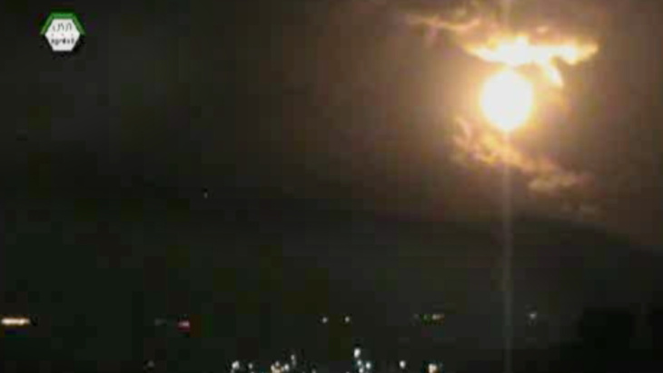 An image taken from video obtained from the Ugarit News, which has been authenticated based on its contents and other AP reporting, shows an airstrike hitting the area around Damascus, Syria, early Sunday.