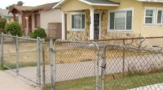 The South L.A. home where 79-year-old Cleo Hughes, the mother of an LAPD officer, was found shot to death on Sunday, June 3, 2012.