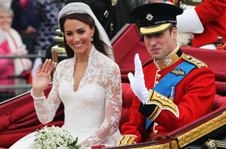 Their Royal Highnesses Prince William, Duke of Cambridge and Catherine, Duchess of Cambridge journey by carriage procession to Buckingham Palace following their marriage at Westminster Abbey on April 29, 2011 in London, England.