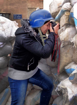 Nour Kelze, a 25-year-old from Aleppo, Syria, was teaching English at a private school when the uprising started two years ago. Since then, she has learned to be a war photographer and has been sending photos to the Reuters news agency.