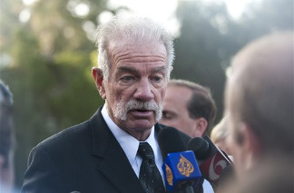 Pastor Terry Jones of the Dove World Outreach Center speaks to the media, Friday, Sept. 10,2010 telling them that he is not going to burn the Quran on Saturday but is traveling to New York to try to meet with the Imam Feisal Abdul Rauf. (