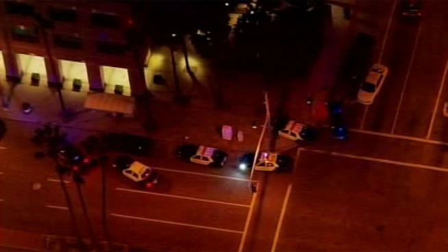 Police and fire officials responded to reports of shots fired at the Long Beach Federal Building.