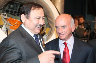 Cosmonaut Talgat Musabayev of Russia (L) and Dennis Tito, the world's first space tourist speaks on April 11, 2011 during a reception devoted to the 50th anniversary of Gagarin's historic first space flight and the upcoming Day of Aviation and Cosmonautics celebrated today in Moscow.