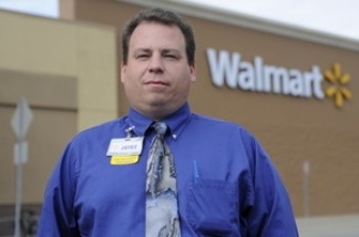 Walmart employee James Buskell expects to graduate with a degree in retail management in 2012.