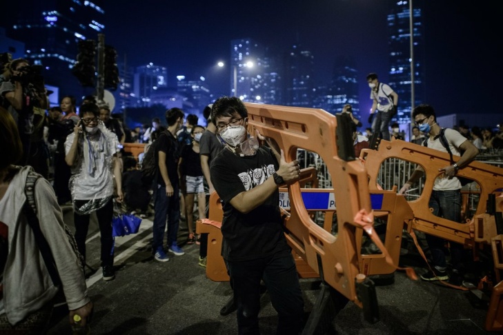 Pro-democracy protesters set up barricades in Hong Kong