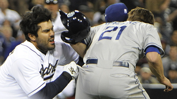 Ouch! Carlos Quentin (left) of the San Diego Padres charged the mound Thursday after Los Angeles Dodgers pitcher Zack Greinke (right) hit him with a pitch. In the brawl, Greinke broke his left collarbone.