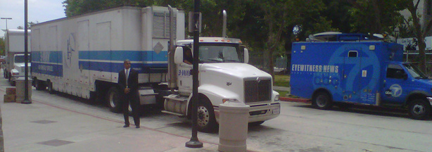 A "man in black" stands guard on Friday, May 28, 2010 beside a moving truck carrying "Mummies of the World," the basis for a new exhibit at the California Science Center in Los Angeles, Calif.