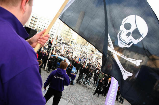 Supporters of the website The Pirate Bay, one of the world's top illegal file-sharing websites, demonstrate in Stockholm, Sweden, in 2009.