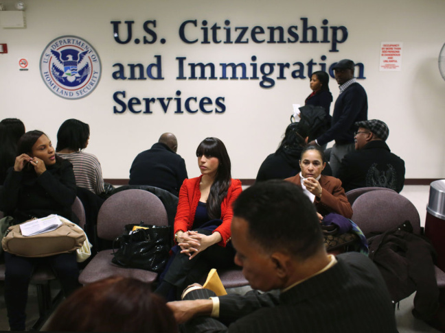 NEW YORK, NY - JANUARY 29: Immigrants wait for their citizenship interviews at the U.S. Citizenship and Immigration Services.