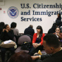 NEW YORK, NY - JANUARY 29: Immigrants wait for their citizenship interviews at the U.S. Citizenship and Immigration Services.