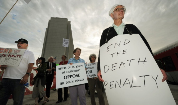 Anti-death penalty campaigners stage a d
