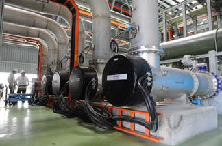 File photo: Singapore-water-environment-Malaysia FEATURE by Martin Abbugao A picture taken on June 1, 2010 shows used water being processed through ultraviolet disinfection at the NEWater plant in Singapore.