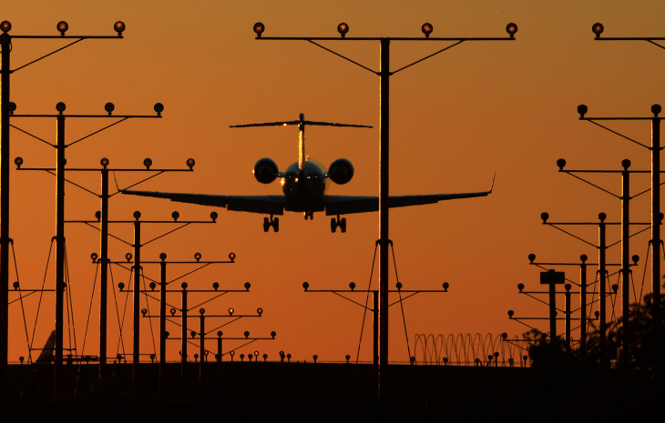 US-CRIME-SHOOTING-AIRPORT lax plane landing takeoff runway orange