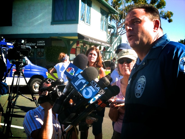 Seal Beach Police Department Sgt Steve Bowles briefs reporters about the shooting of nine people in a beauty salon in Seal Beach