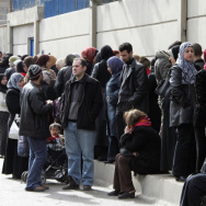 Iraqis wait outside the United Nations H