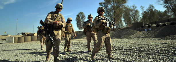 US Marines of the 2nd Battalion, 1st Marines Regiment leave FOB Delhi for a patrol in Garmser, Helmand Province, Afghanistan on March 14, 2011.