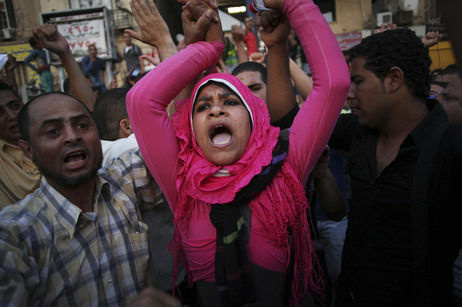 Egyptian protesters chant slogans against the country's military ruling council and presidential candidate Ahmed Shafiq in Tahrir Square in Cairo, Egypt on Thursday.