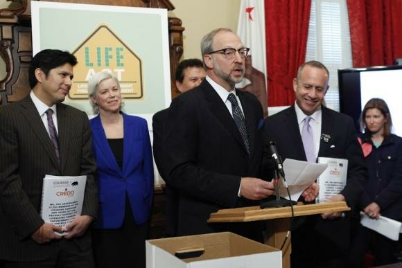 Rick Jacobs (at podium), seen here with California Senate President pro Tem Darrell Steinberg (right), has been involved with many progressive causes through his work with the Courage Campaign.