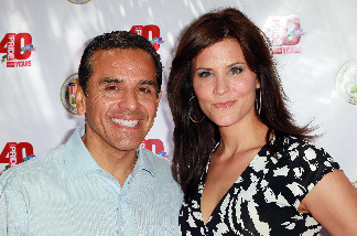 Los Angeles Mayor Antonio Villaraigosa (L) and broadcast journalist Lu Parker attend a garden party hosted by Villaraigosa in honor of LA Pride at Getty House on June 6, 2010 in Los Angeles, California.