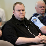 Megaupload boss Kim Dotcom looks as he i
