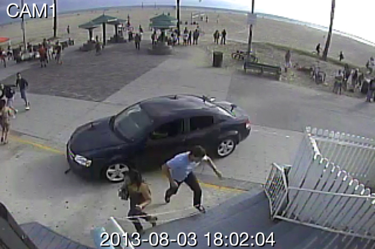 APTOPIX Car Into Beachgoers