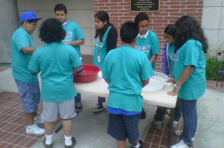 Day campers conduct experiments at USC Summer Science Camp, July 22, 2010.