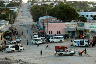 A view of the strategic junction in town, known as "Kilometer 4." While Mogadishu is very dangerous, bullets aren't flying all the time, and when things are calm people are often out and about shopping and chatting.