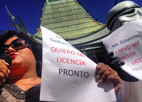 Protesters hold a news conference in Hollywood October 2013 to ask the Governor to speed up the process for unlicensed drivers to apply for driver's licenses in California.