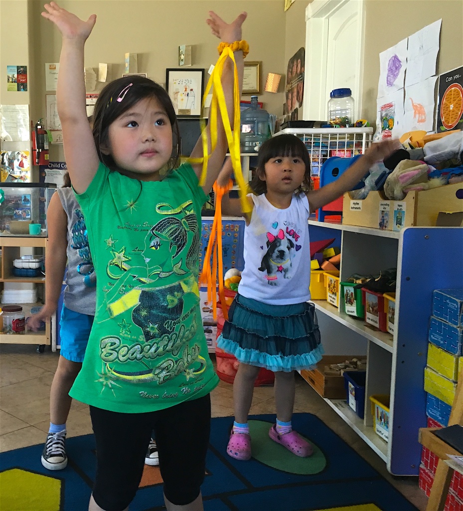 Preschoolers start their day with ribbon stretching at Joy of Learning Academy in Rowland Heights.