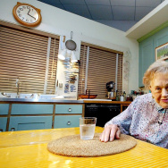 Julia Child sits in her kitchen after being moved