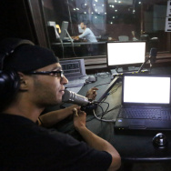 Libyan presenters work at the studio of Radio Zone in Tripoli, Libya, in 2012. The radio station's owners hope to teach a new generation about democracy.