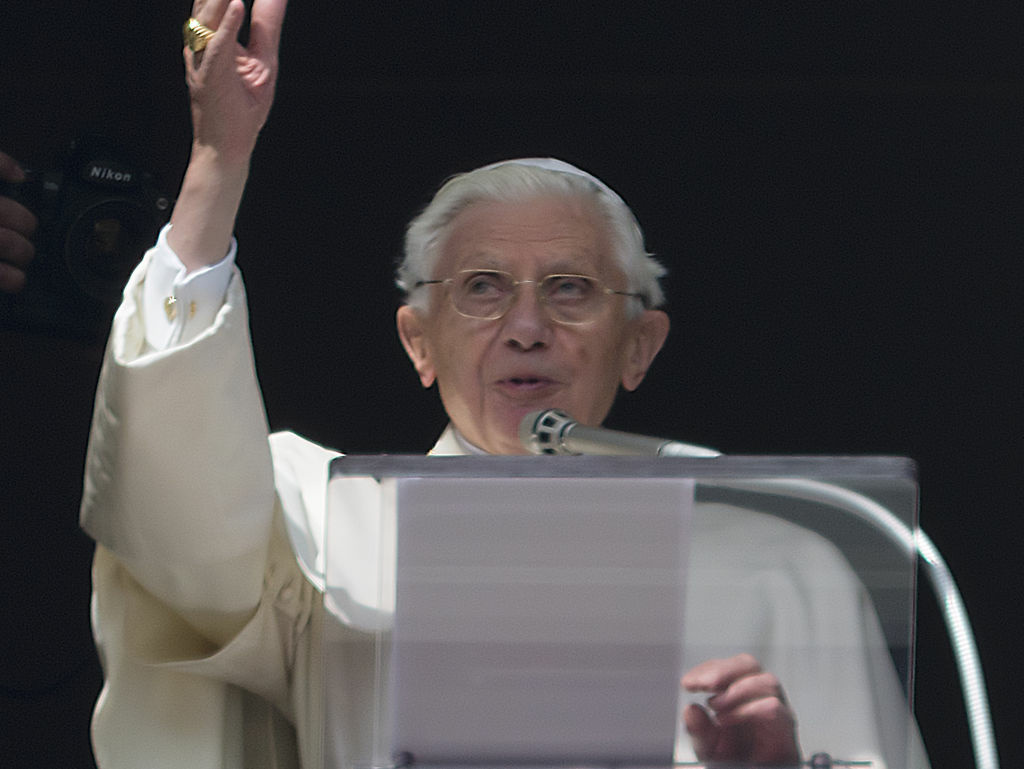 Pope Benedict XVI delivers his blessing Sunday during his last Angelus noon prayer, from the window of his studio overlooking St. Peter's Square at the Vatican.