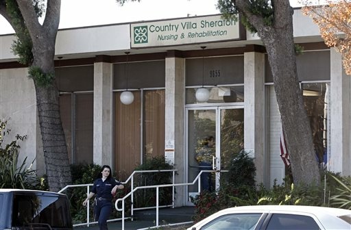 Los Angeles Police Department officers arrive at the Country Villa Sheraton nursing facility in the North Hills area of Los Angeles Wednesday, Dec. 11, 2013. Lance Holger Anderson, 60, of suburban Santa Clarita, was charged with murder in the shootings of his dementia-stricken wife and his sister, who was in a vegetative state at a nursing home.