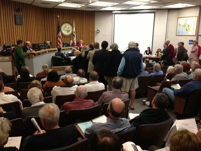 Dock owners crowded Newport Beach's old city hall, but the dock fee passed 5-1.