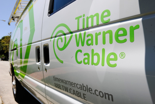 Time Warner Profits Rise 14 Percent