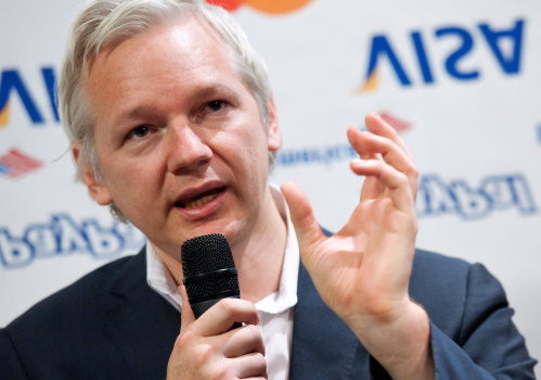 Wikileaks founder Julian Assange stands