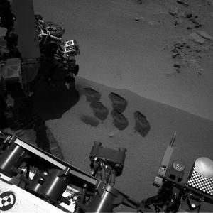 NASA's Mars rover Curiosity dug up five scoops of sand from a patch nicknamed "Rocknest." Officials announced that findings will be presented on Monday.