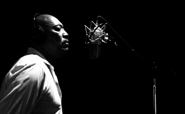 Singer Larry Davis, 74, closes his eyes at Miles Recording and Mix as he records the followup to "Close Your Eyes."