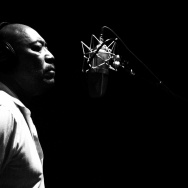 Singer Larry Davis, 74, closes his eyes at Miles Recording and Mix as he records the followup to "Close Your Eyes."