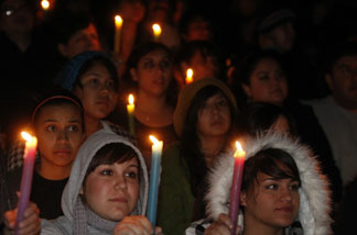 Students of the El Monte community join in a candlelight vigil at Mountain View High School.